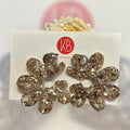 Boucles d’oreilles fleur pailletée – Résine dorée scintillante – Bijoux faits main, élégants et lumineux
