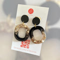 Boucles d’oreilles Rongy dorée et noir | Résine pailletée or | Bijoux faits main en Normandie