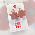 Boucles d’oreilles fleurs rose poudrée