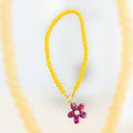 Collier Perles Jaunes & Pendentif Fleur Pailleté